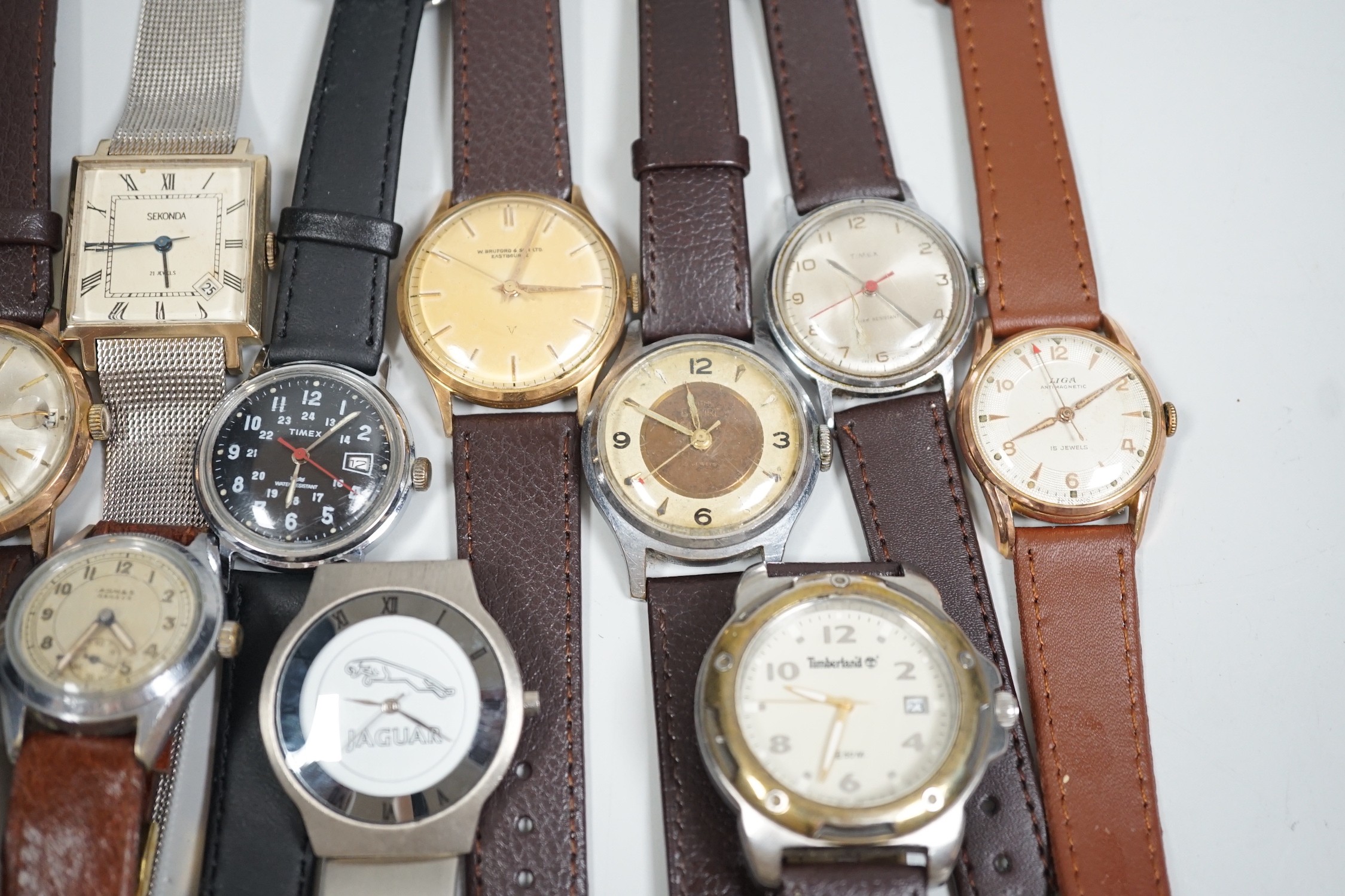 A collection of twelve assorted mainly gentleman's wrist watches, including Cyma, Sekonda and Timex.